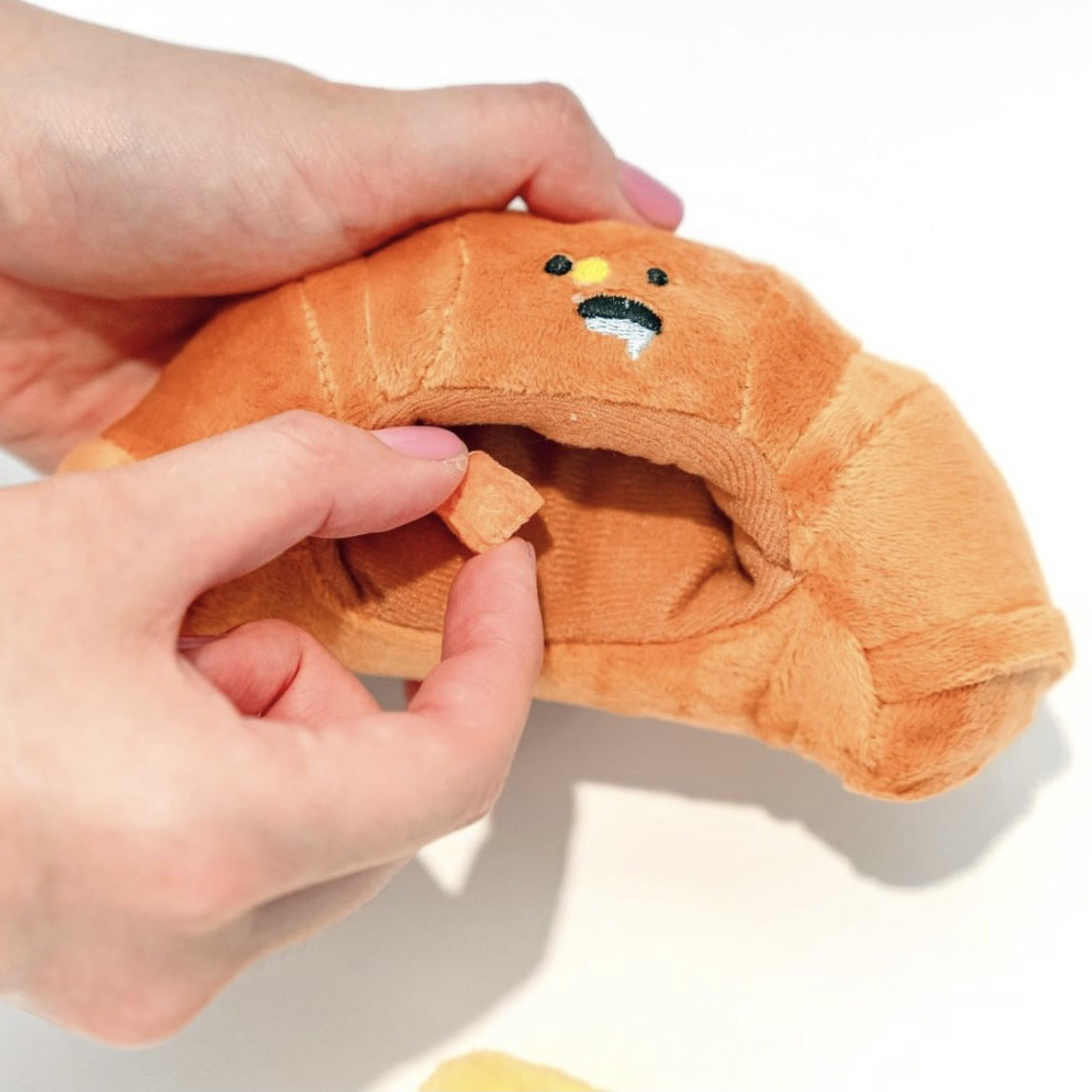 Le Croissant: Interaktives Schnüffel- & Quietschspielzeug