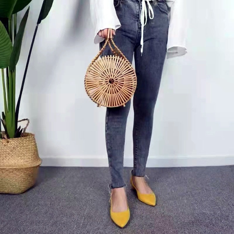 Island Arc – Architektonische Bambus-Clutch im Boho-Chic