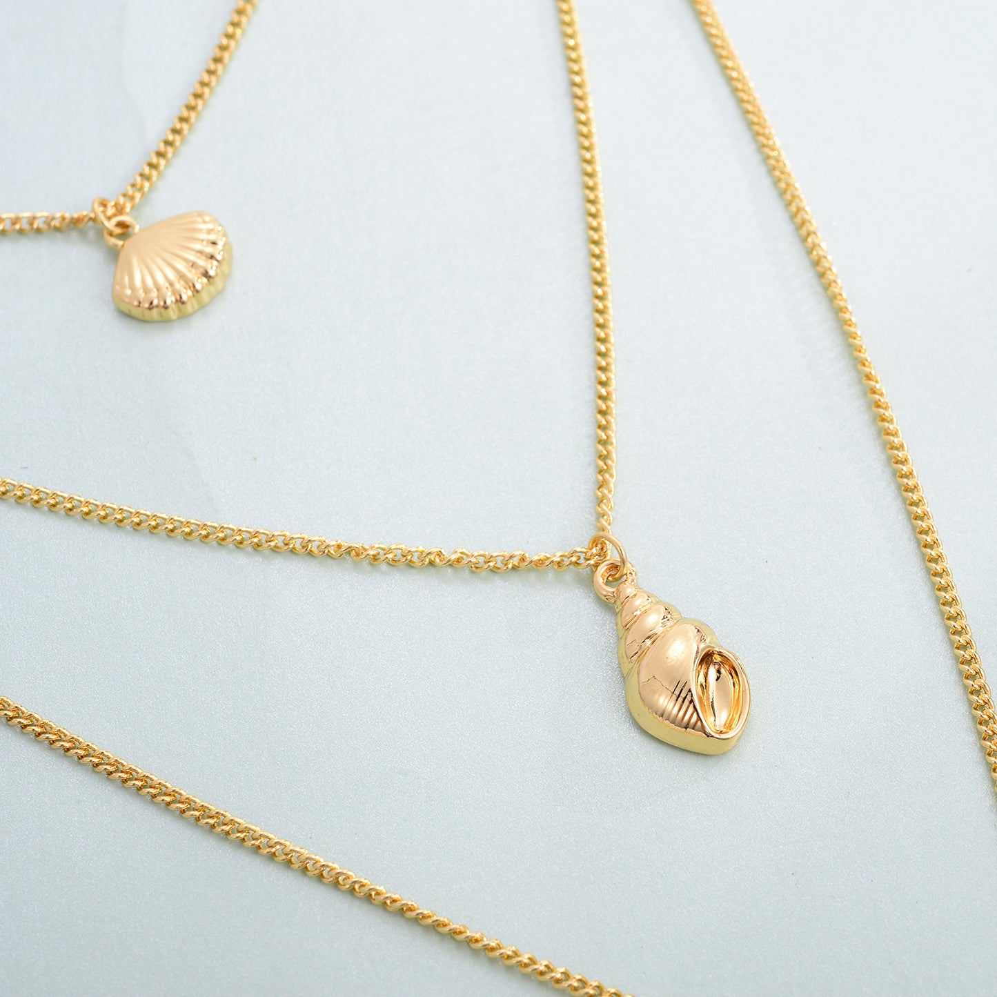 Triple Shell Harmony – Dreilagige Muschel-Halskette