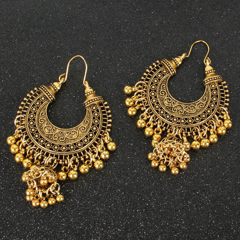 Golden Bell: Massive Boho-Ohrringe mit Glöckchen-Tassels