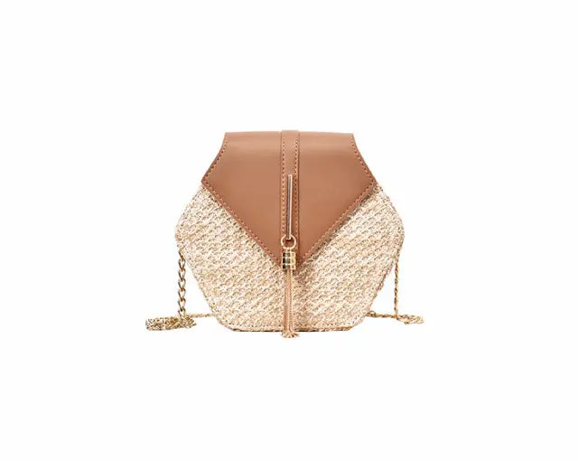 Hexa-Chic: Strukturierte Boho-Schultertasche aus Stroh & Leder mit Tassel-Detail