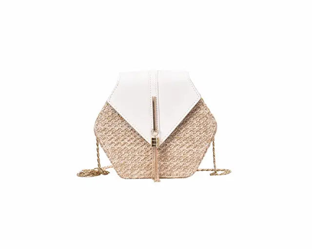 Hexa-Chic: Strukturierte Boho-Schultertasche aus Stroh & Leder mit Tassel-Detail
